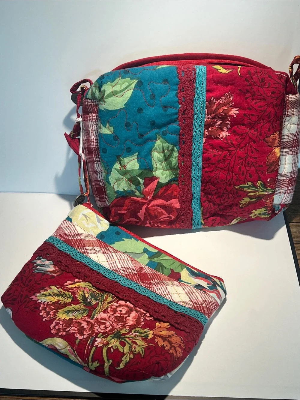 April Cornell Red Floral Quilted Cosmetic Crossbody with Teal Accents
